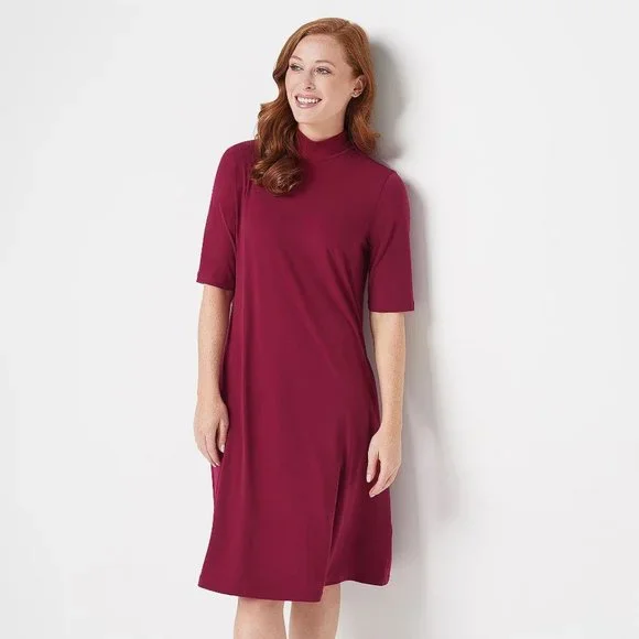 knitted black midi dress Black Knit Midi Dress with Gold Buttons by Tanroh Womenswear  TANROH